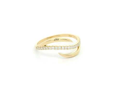 18K yellow gold diamond crossover ring featuring a flowing twist design set with 0.21 carat natural diamonds.