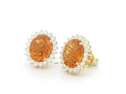 Oval amber-hued citrine stud earrings in 18K yellow gold with diamond sunburst halo – 5.35 carats total