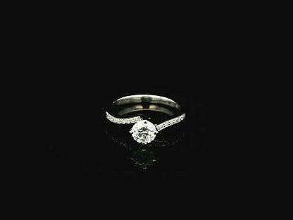 0.51 carat round diamond engagement ring in 18K white gold with curved diamond band – Emirates Diamonds
