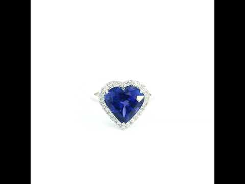 18K white gold heart tanzanite halo ring featuring a 5.89 Carat natural heart-shaped tanzanite surrounded by natural diamonds.