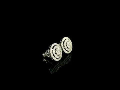 Diamond circle stud earrings in 18K white gold featuring concentric rows of round brilliant diamonds.