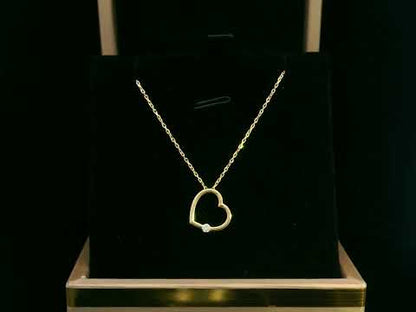 Minimalist 18K gold open heart necklace with 0.04 Ct diamond pendant, elegant and timeless jewelry gift