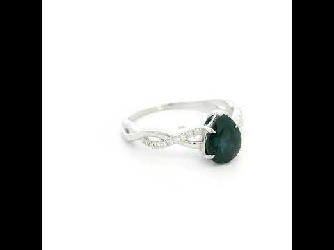 Pear shaped blue sapphire and diamond twist ring in 18K white gold