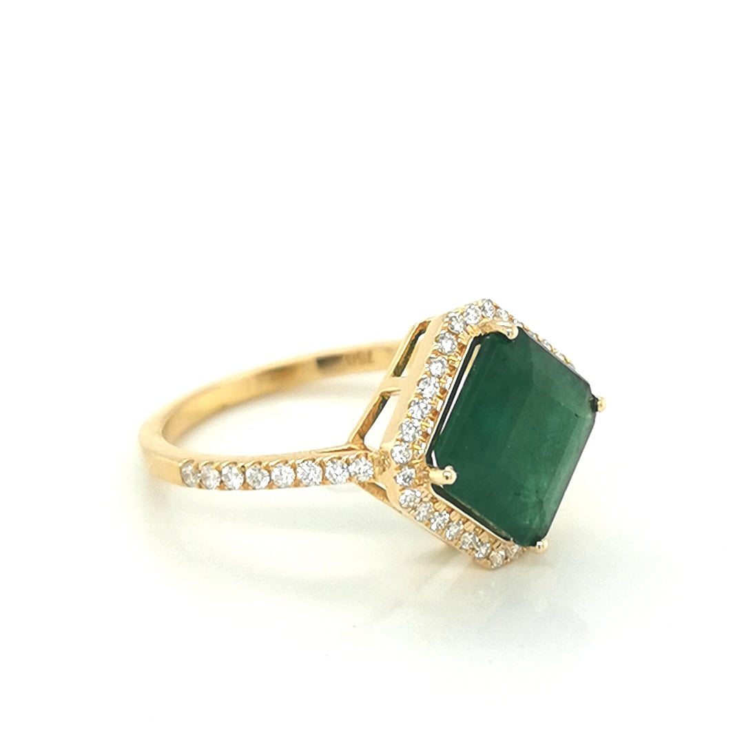 Halo Emerald And Diamond Ring In 18k Yellow Gold.