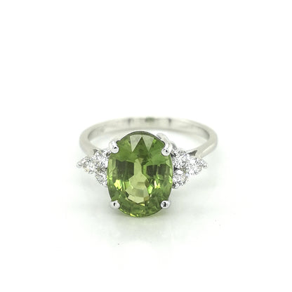 Peridot And Diamond Ring In 18k White Gold.