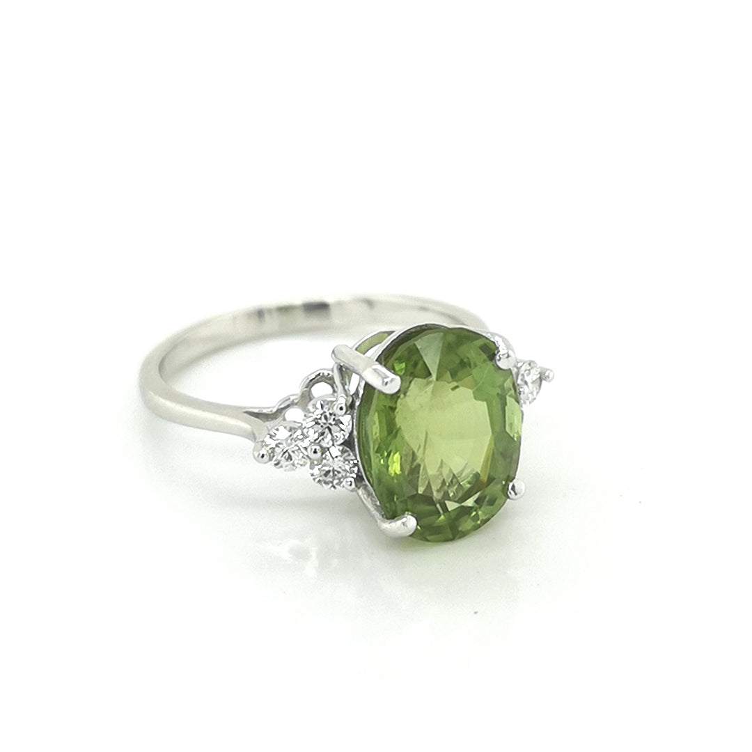 Peridot And Diamond Ring In 18k White Gold.