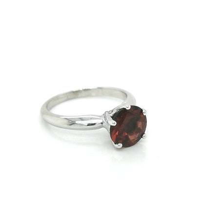 Solitaire Garnet Ring In 18k White Gold.