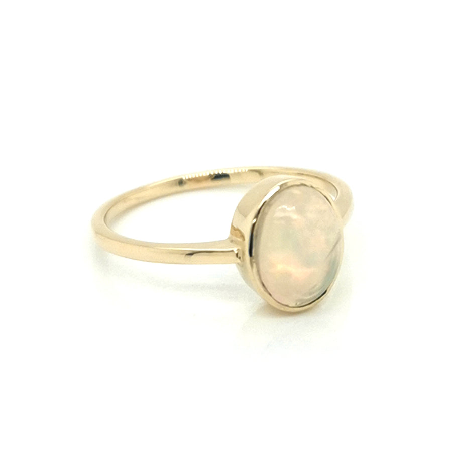 Solitaire Opal Ring In 18k Yellow Gold.