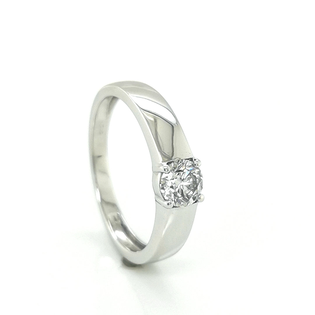 Wide Band Solitaire Diamond Ring In 18k White Gold.