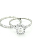 Emerald Cut Solitaire Diamond Bridal Set With Halo In 18k White Gold.