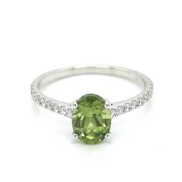 Solitaire Peridot And Diamond Ring In 18k White Gold.