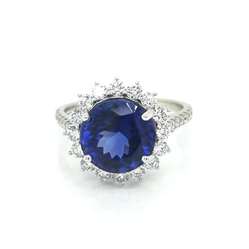 Tanzanite And Diamond Halo Ring In 18k White Gold. Birthstone For The Month Of December