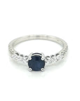 Solitaire Sapphire And Diamond Ring In 18k White Gold.