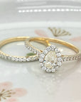 Pear Shape Halo Diamond Engagement Ring And Wedding Band In 18k Yellow Gold.