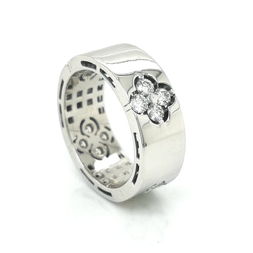 Flat, Pipe Cut Band Diamond Ring With A Floral Cluster In 18k White Gold.