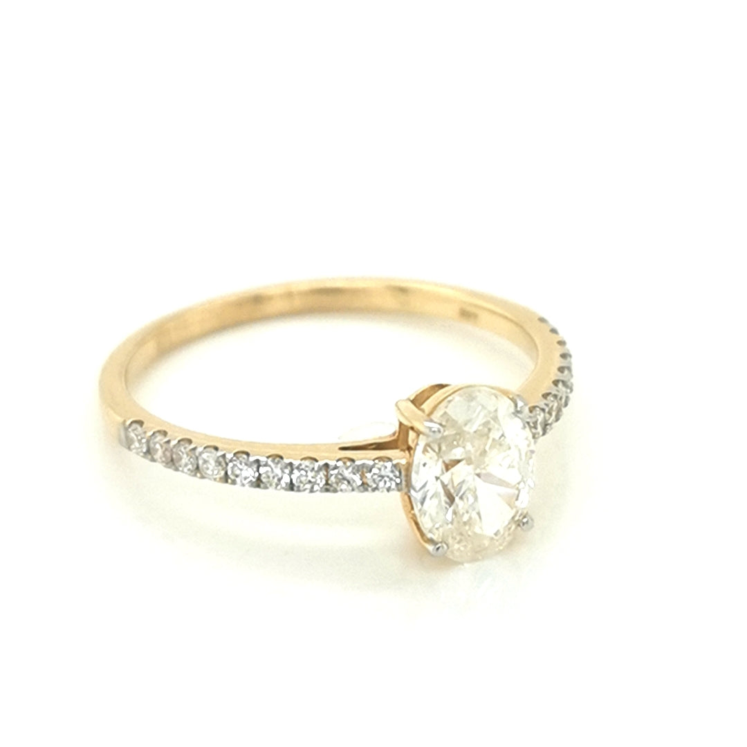 Solitaire Oval Diamond Engagement Ring In 18k Yellow Gold.