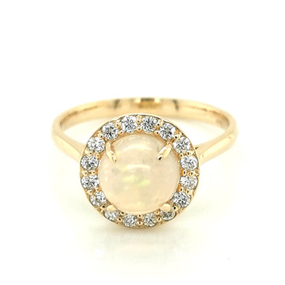 Round Opal And Diamond Halo Ring In 18k Yellow Gold.