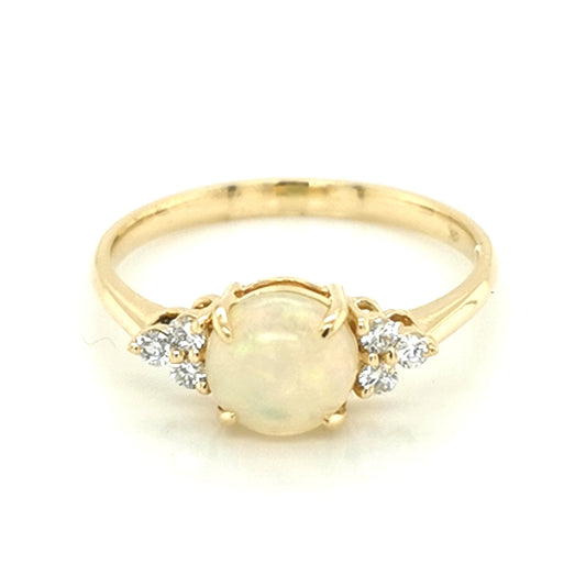 Round Opal And Diamond Ring In 18k Yellow Gold.