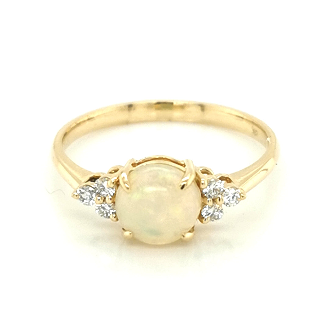 Round Opal And Diamond Ring In 18k Yellow Gold.