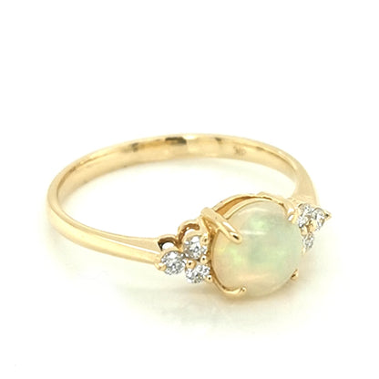 Round Opal And Diamond Ring In 18k Yellow Gold.