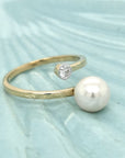 Fresh Water White Pearl And Diamond, By Pass Design Ring In 18kYellow Gold.