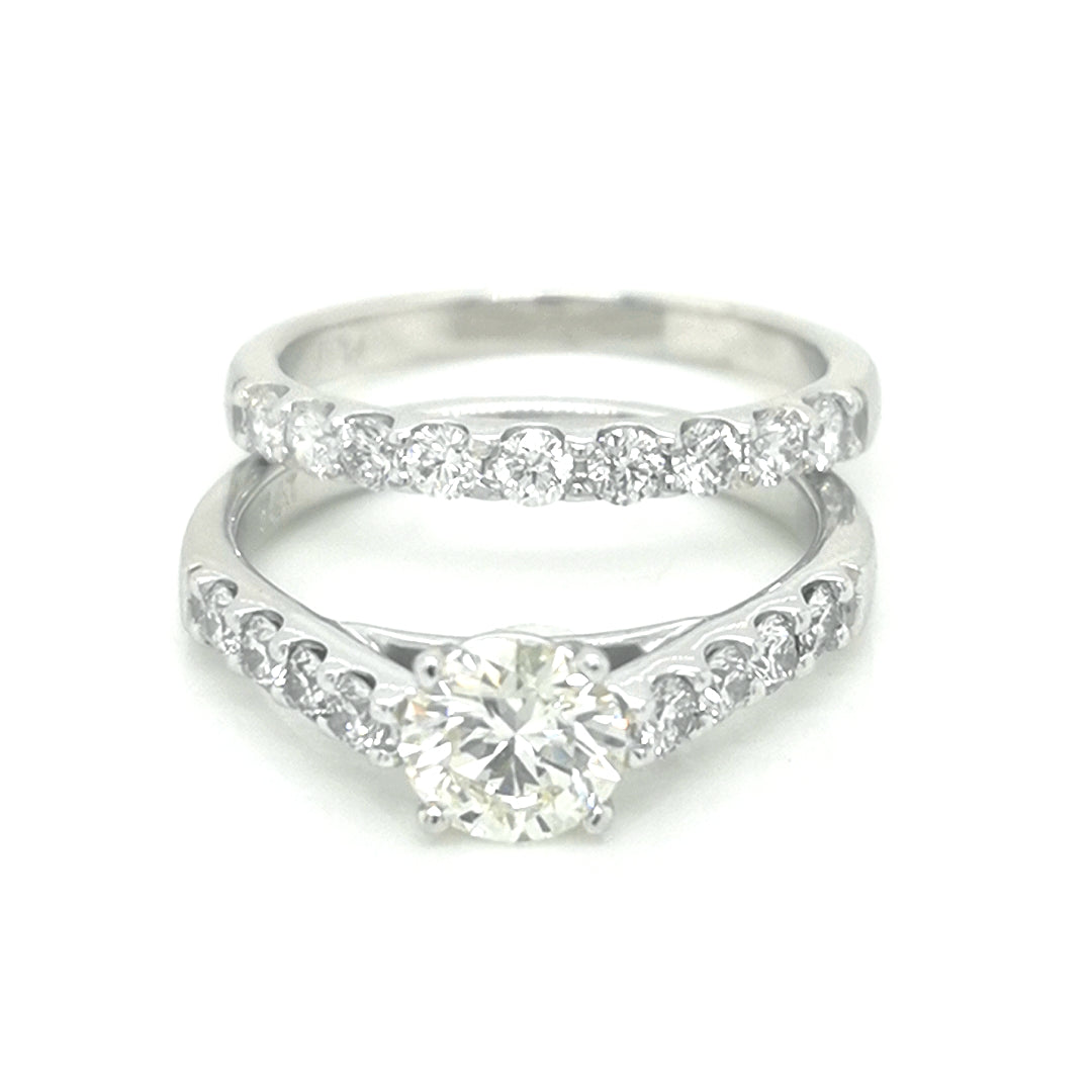 Solitaire Engagement Ring And Wedding Band Set In 18k White Gold.