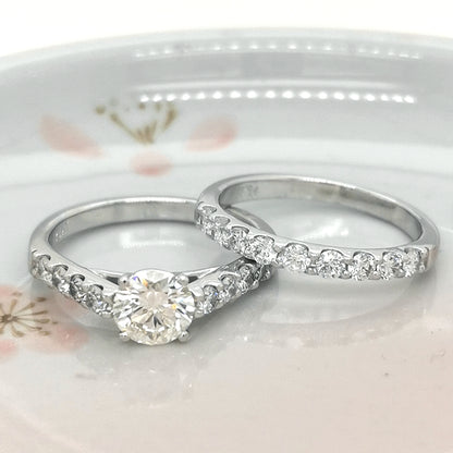 Solitaire Engagement Ring And Wedding Band Set In 18k White Gold.