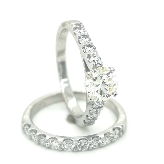 Solitaire Engagement Ring And Wedding Band Set In 18k White Gold.