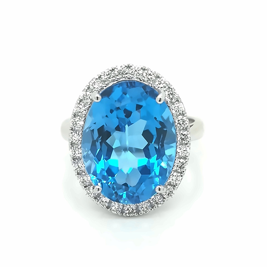 Blue Topaz And Diamond Ring In 18k White Gold.