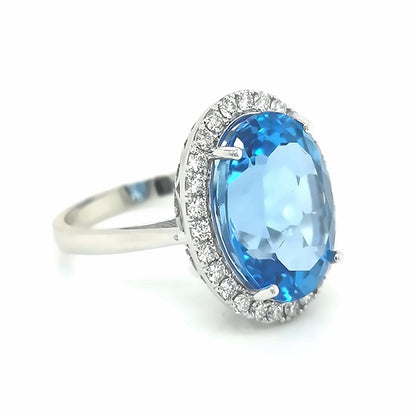 Blue Topaz And Diamond Ring In 18k White Gold.