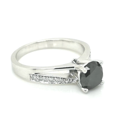 Solitaire Black Diamond With Diamond Ring In 18k White Gold.