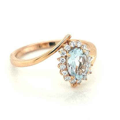 Bypass Design Aquamarine And Diamond Ring In 18k Rose Gold.