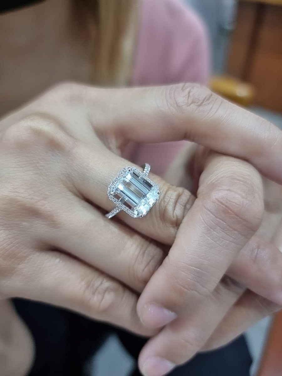 Emerald Cut Aquamarine Engagement Ring Crafted In 18K White Gold
