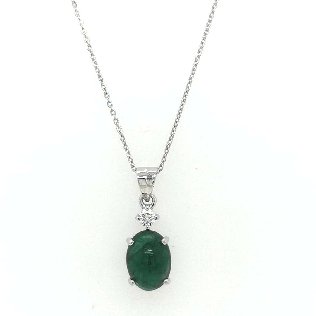 Oval Shape Emerald Pendant Crafted In 18K White Gold