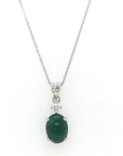 Oval Shape Emerald Pendant Crafted In 18K White Gold