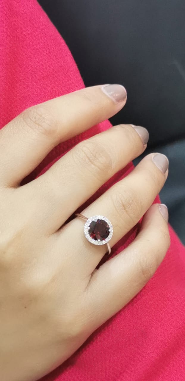Round Shape Garnet And Diamond Ring Crafted In 18K White Gold