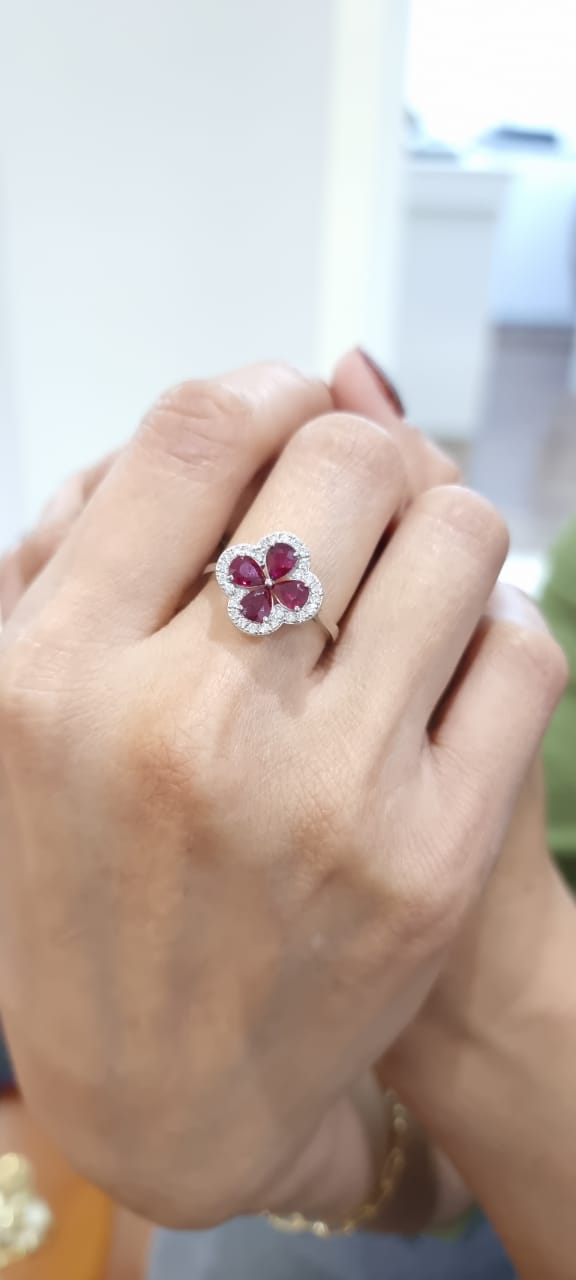 Flower Motif Ruby And Diamond Ring In 18k White Gold.