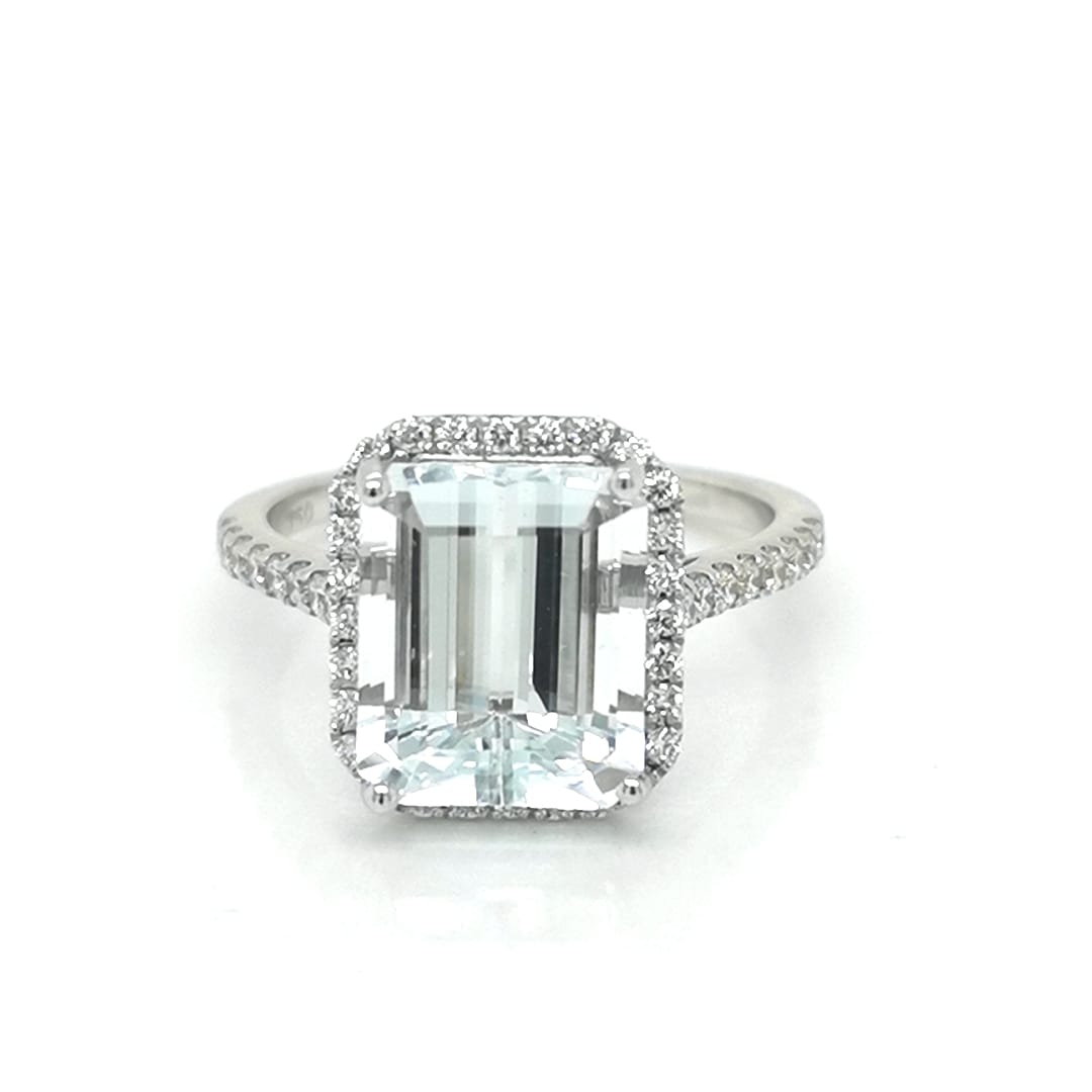 Emerald Cut Aquamarine Engagement Ring Crafted In 18K White Gold