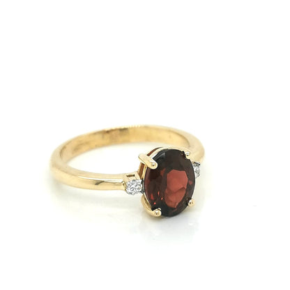 Garnet And Diamond Ring Crafted In18K Yellow Gold