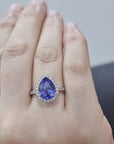 Halo Tanzanite And Diamond Ring Crafted In 18k White Gold