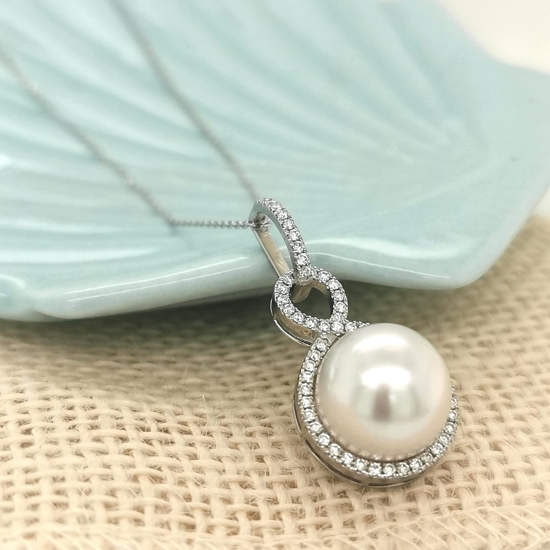 Infinity Design Pearl And Diamond Pendant In 18k White Gold.