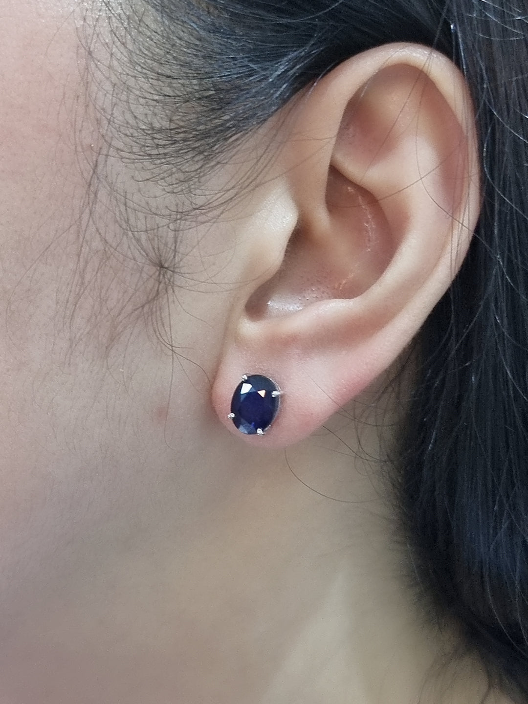 Enjoy The Dashing Twinkle Of These Dazzling Blue Sapphires! This Perfectly Matched Pair Of Oval-Shaped Gems Are Set In An 18k White Gold Setting, Secured With Four Prongs And Push Backs, For A Look That’s Truly Show-Stopping! Perfect For Adding A Hint Of Chic Sparkle To Any Ensemble. Let The Sapphires Do The Talking!