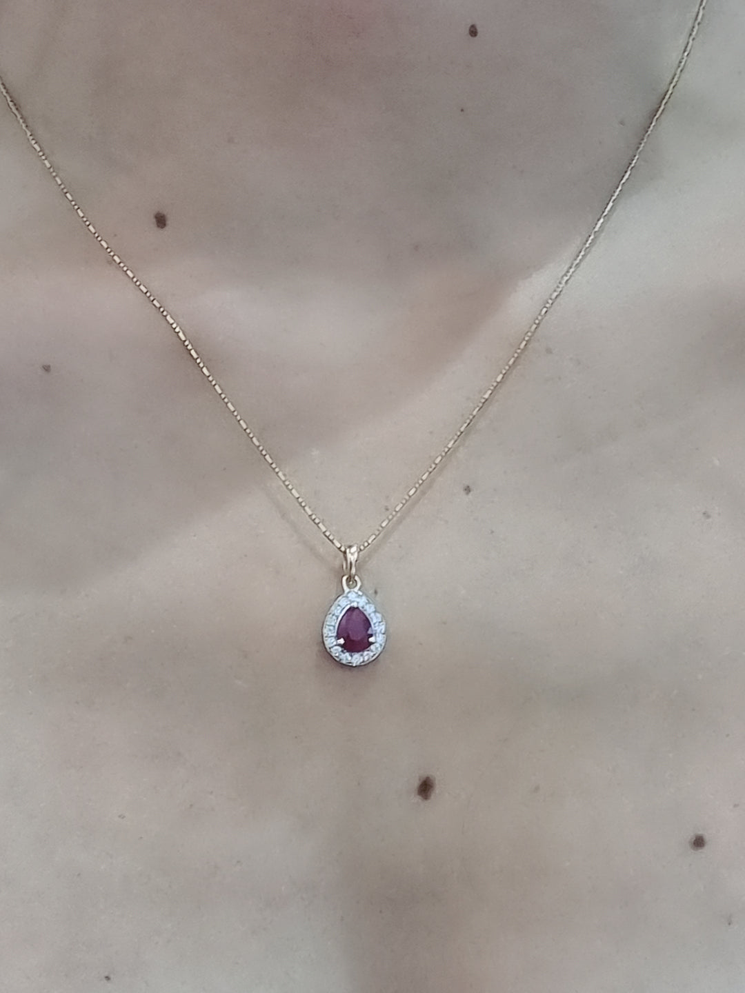 Ruby And Diamond Pendant In 18k Yellow Gold.