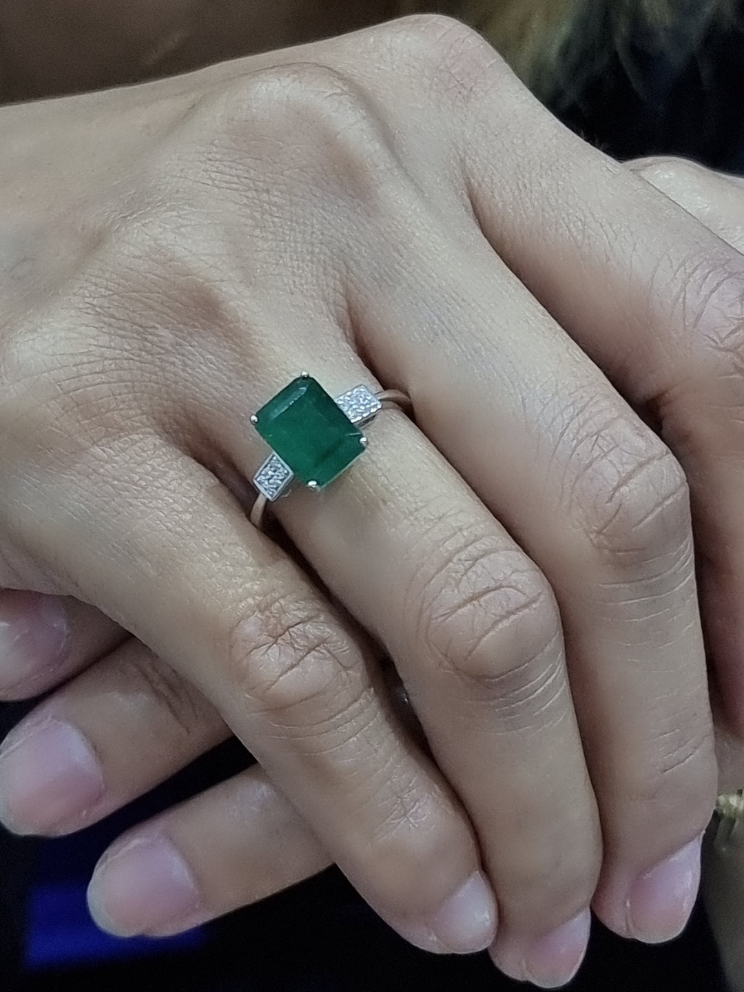 Emerald And Diamond ring In 18k White Gold.