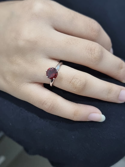 Solitaire Garnet Ring In 18k White Gold.