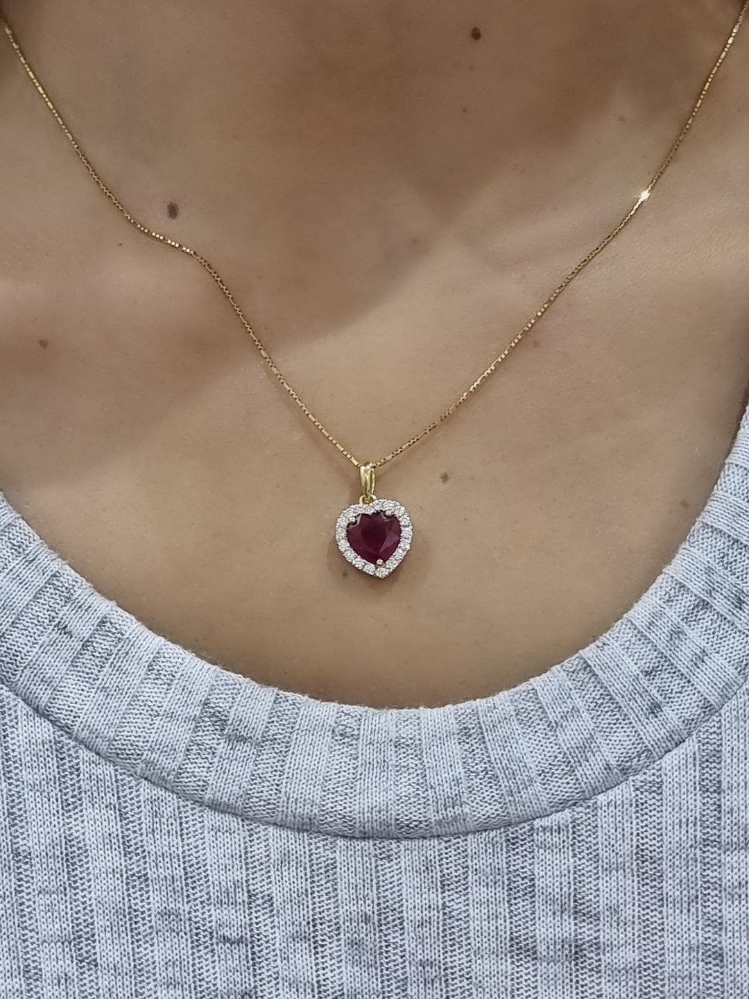 Heart Shape Ruby And Diamond Pendant In 18k Yellow Gold.