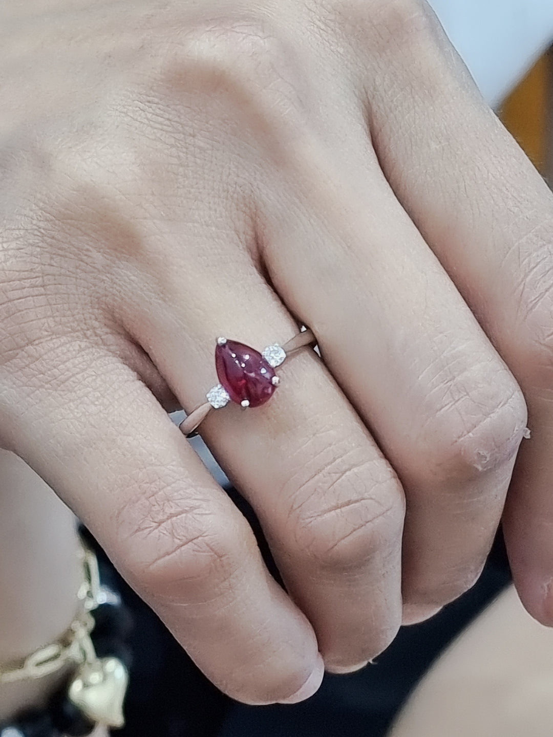 Pear Shape Cabochon Ruby And Diamond Ring In 18k White Gold
