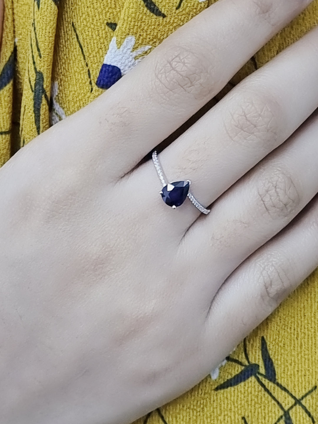 Solitaire Pear Shaped Sapphire Ring In 18k White Gold