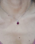 Ruby And Diamond Pendant In 18k White gold.