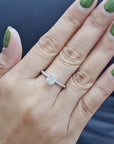 Emerald Cut Solitaire Diamond Ring In 18k White Gold.